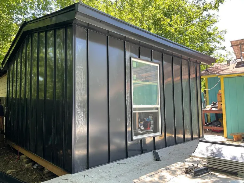 Black standing seam metal wall panels for Roof Inspection in Round Lake